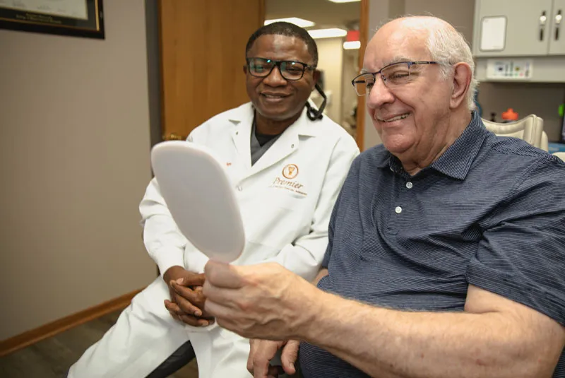 The doctor with a middle-aged male patient